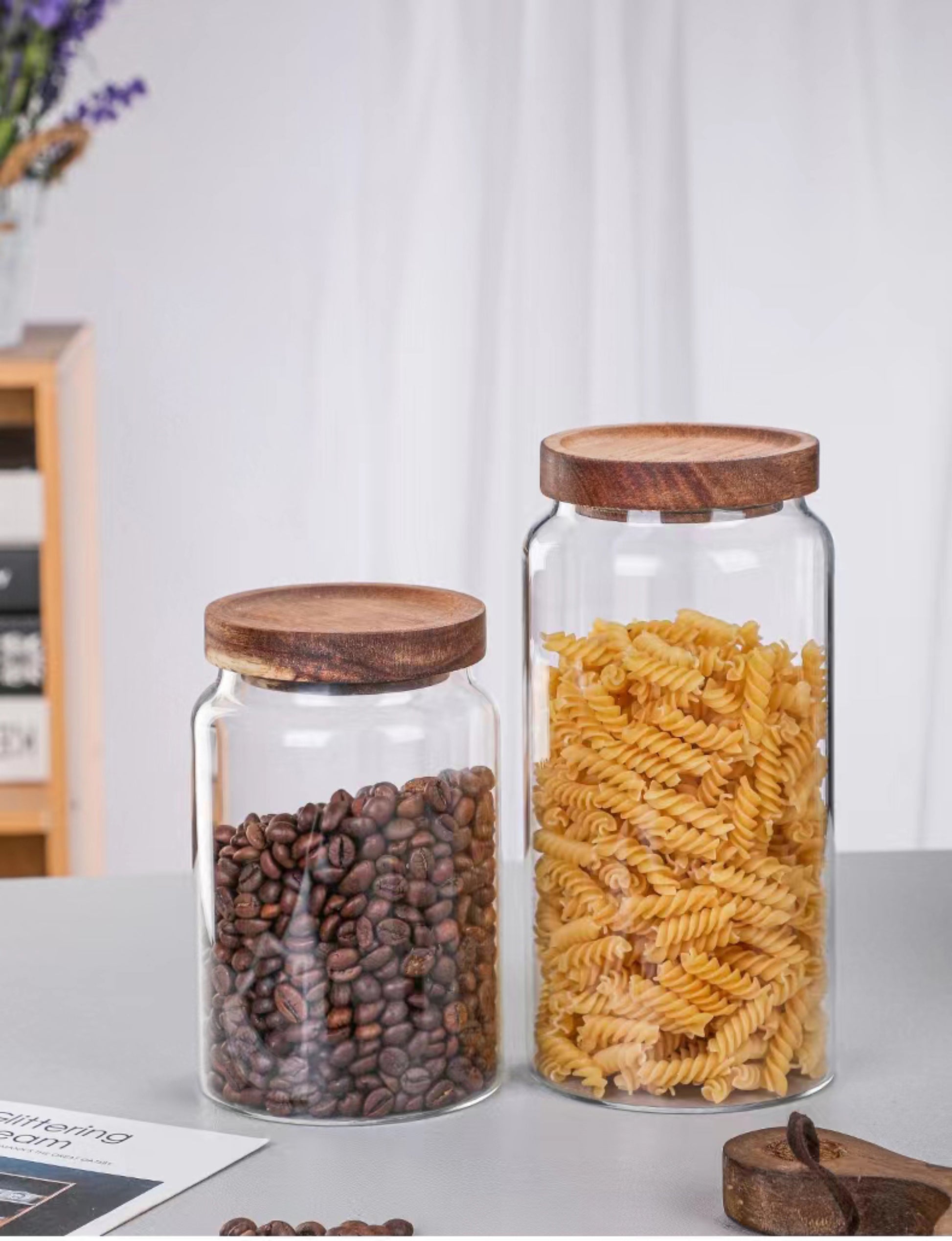 Two different size glass jars with acacia lids